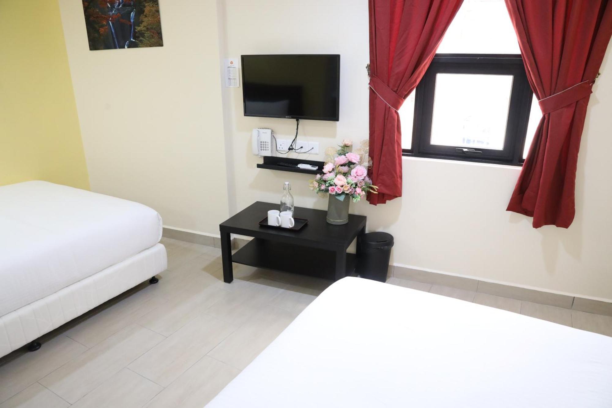 Capital O 90897 Island City Hotel George Town Exteriör bild