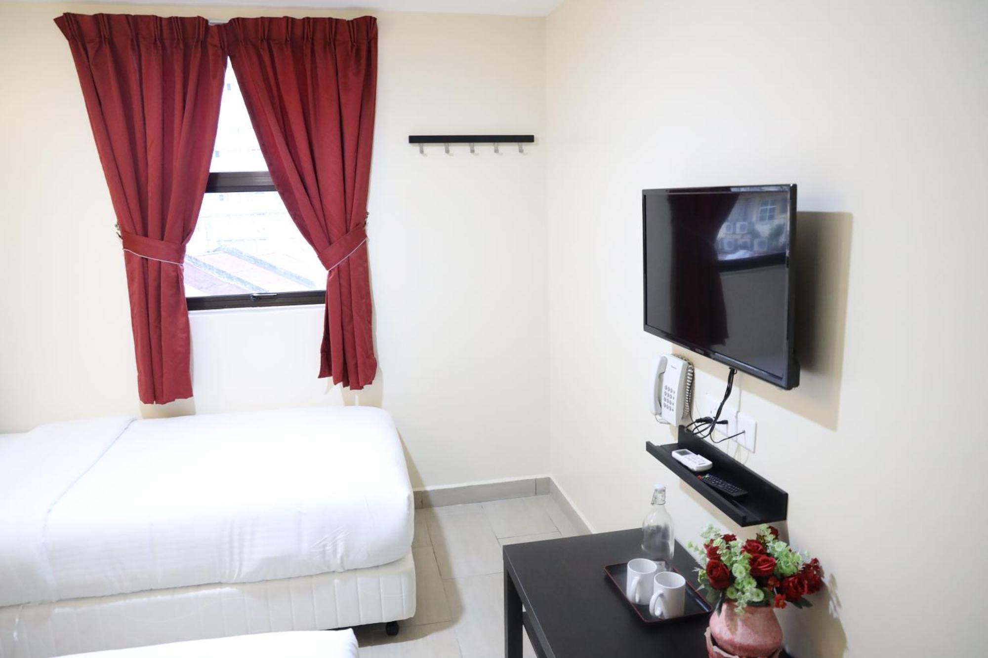 Capital O 90897 Island City Hotel George Town Exteriör bild
