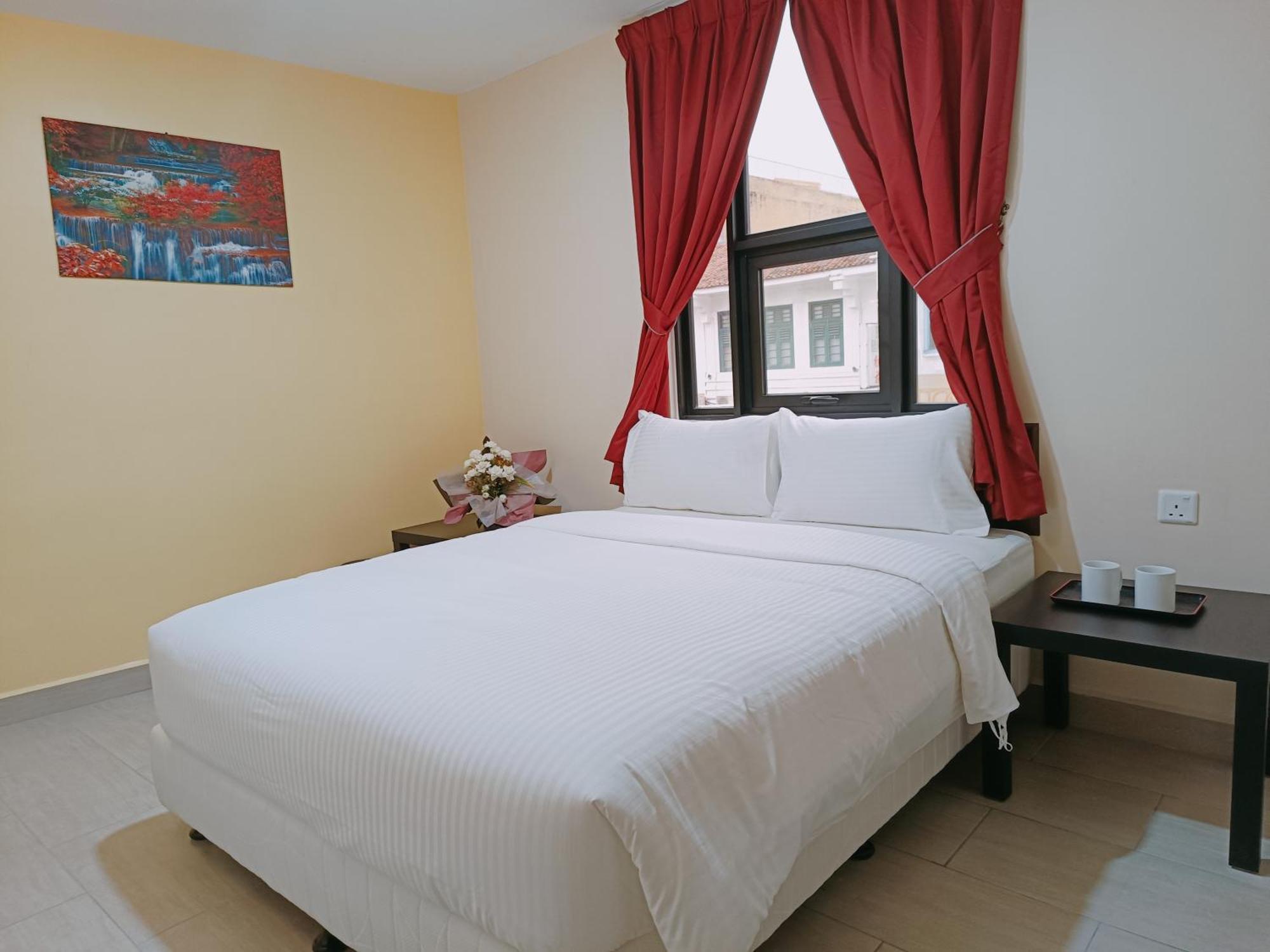 Capital O 90897 Island City Hotel George Town Exteriör bild